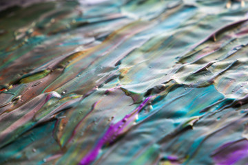  multi-colored liquid paint on a colored background abstract drawings