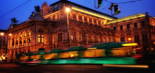 Long exposure shot of tram in Vienna at night. Opera at night, Vienna, Austria.