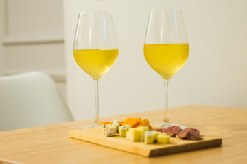 Two wineglass with set of meal