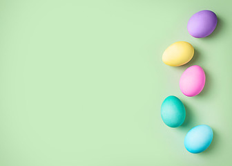 Easter colorful flat lay with eggs row