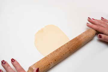 female hands prepare the dough