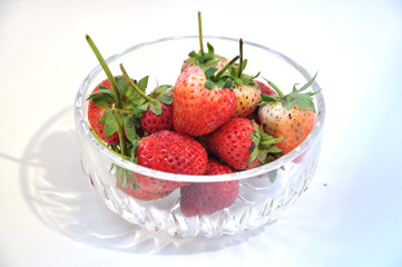 fresh strawberry in glass blow