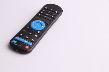 TV remote control in color background