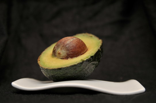 avocado on black background