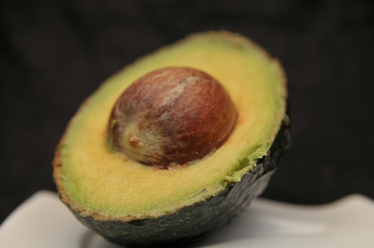 avocado on black background