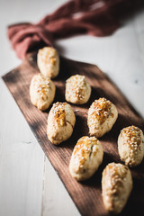 Turkish salted cookies with sesame on wood. It is called 