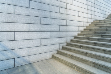 Concrete Staircase with concrete wall out of building - side view