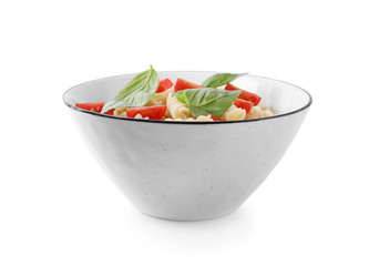 Delicious fusilli pasta with tomatoes isolated on white