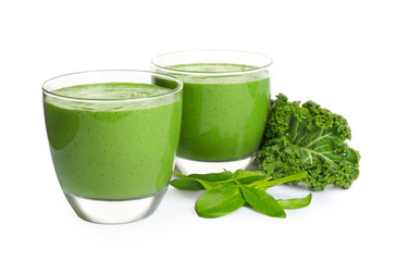 Tasty fresh kale smoothie with spinach isolated on white