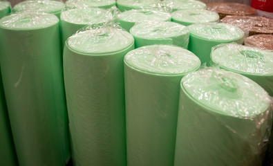 Rolls of foam underlayment for the Laminate Flooring in a shop