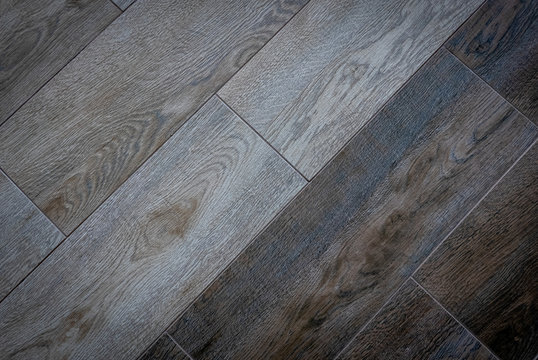 Ceramic tiles flooring - texture of natural ceramic floor decorating as wood