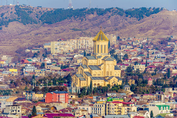 Fototapeta na wymiar Holy Trinity Cathedral in Tbilisi in winter 2020. Bird's eye view