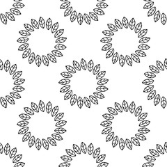 Seamless pattern of hand-drawn leaves. Black and white doodle illustration of leaves.