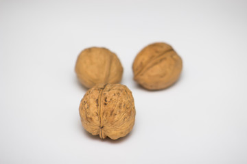 Walnuts close up on a white background. Free space for text