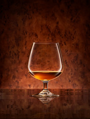 Whisky glass on wood