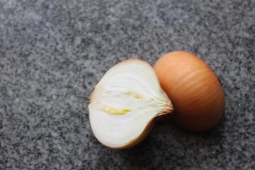 chopped onion on a granite table