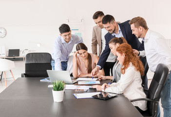 Group of business people during meeting in office