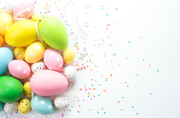 Fototapeta na wymiar multi-colored bright easter eggs lie on a white background