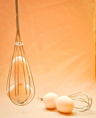 Fresh egg in whisk
