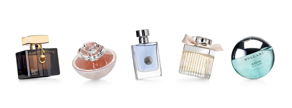 Barcelona-Spain- 12th December 2015- Studio shot of distinguished perfume brands for women and men photographed in a dynamic and funny positions.Gucci- Guerlain- Verssace-Chloe
