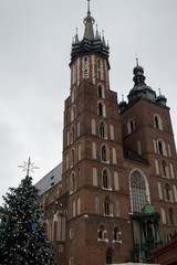 Fototapeta na wymiar Saint Mary's Basilica, or Church of the Assumption of the Blessed Virgin Mary - Catholic parish church of Gothic architecture in Krakow.