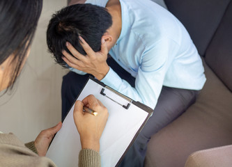 Male patients with mental illnesses and physical illnesses are discussing with a doctor or...