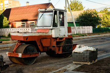 Fototapeta na wymiar Machine for asphalting and repair of road.
