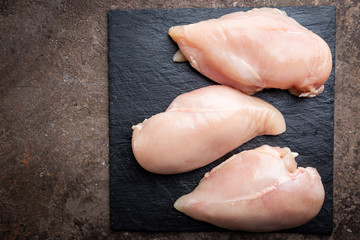 Fresh raw chicken breast, top view. Culinary cooking ingredients
