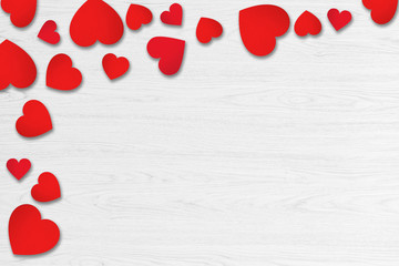 Red hearts on white wood background. Valentines Day concept.