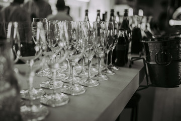 Luxury table settings for fine dining with and glassware, beautiful blurred background. For events, weddings. Preparation for holiday dinner night. props for weddings, birthdays, and celeb