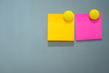 Empty paper stick note on a white background.