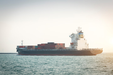Fototapeta premium Logistics and transportation of International Container Cargo ship