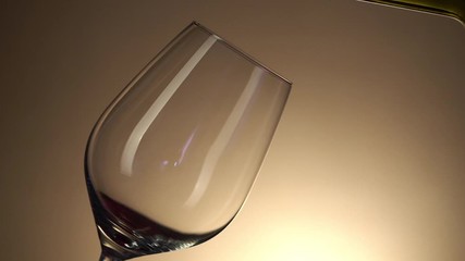 Close-up of filling wine glass with red wine in slow motion - Powered by Adobe