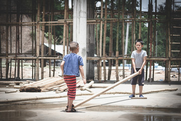 Poor children working in construction, Illegal child labor, Concepts of human trafficking and human rights