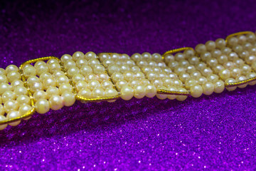 Waist belt jewellery made out of pearls. Jewellery for young girls.