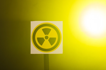 Radioactivity and sign concept - Radiation hazard sign on background