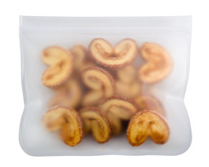 sweet cookies in takeaway package flat lay