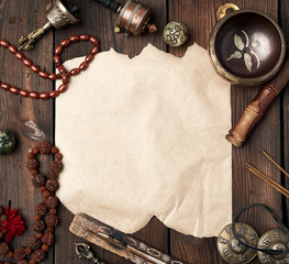 tibetan religious objects for meditation and alternative medicine, empty brown sheet of paper