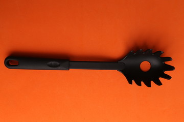 kitchen utensils in color background