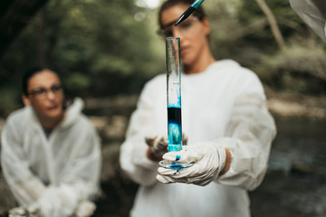Team of scientists and biologists researching possibilities for bacteria and virus spreading...