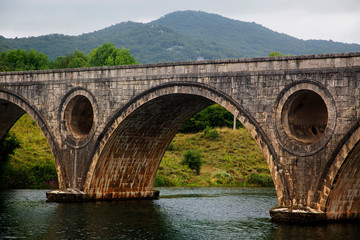 Fototapeta na wymiar Bridge in Kosinj on River Lika, Croatia