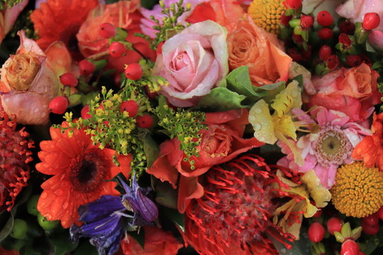 Bridal flowers in orange, yellow and pink