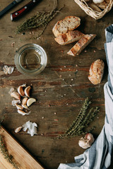 Set of sliced bread. Ingredients for cooking. Wooden background with bread. Empty space for signatures.