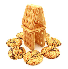 Composition of cookies, gingerbread house on a white background
