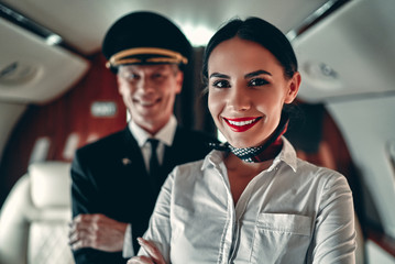Pilot and flight attendant in private jet