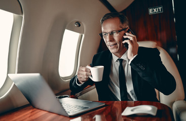Businessman in private jet