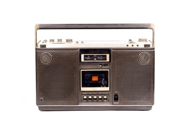Retro portable stereo radio cassette recorder isolated on white background