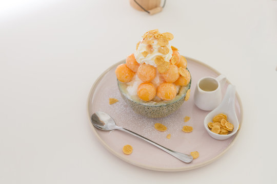 Delicious of dessert, Bingzu the korean style shave ice with fruit and cereal, Diet fruit and sweet food menu concept.