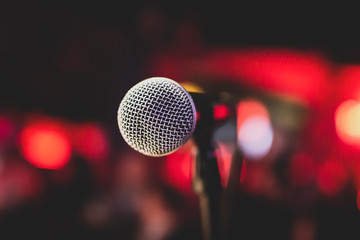 microphone on stage with spotlight on stage