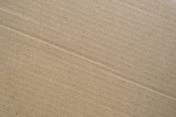 Fototapeta na wymiar Brown corrugated cardboard box background. Concept of packaging and shipping
